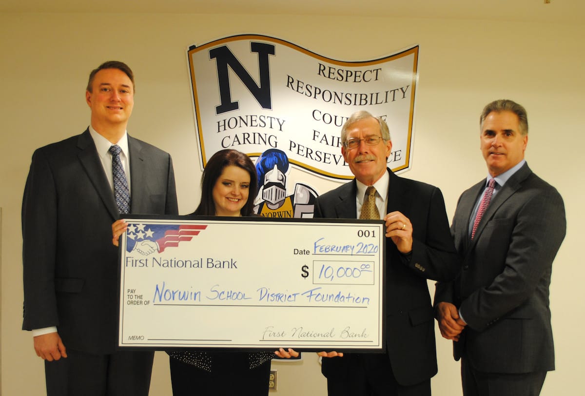 From left to right: Dr. Jeff Taylor, Superintendent, Norwin School District; Ms. Heidi Stratton-Minor, FNB Circleville Office Branch Manager; Dr. John Boylan, Norwin School District Community Foundation President; and Mr. Paul Puleo, a Senior Vice President with FNB.